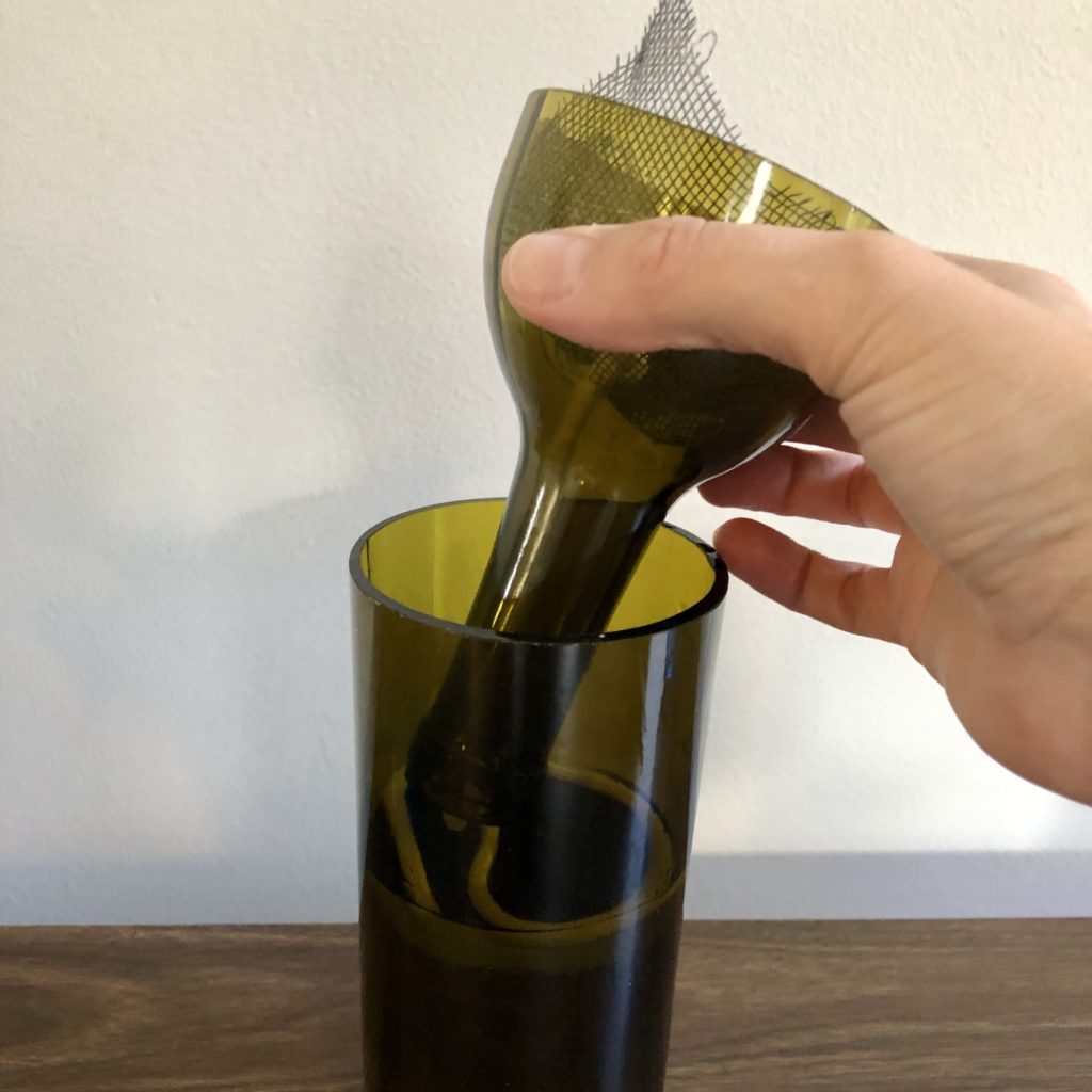 set bottle top in water