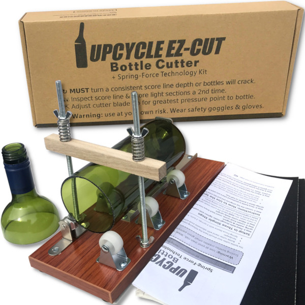 Upcycle EZ-Cut official photo of the bottle cutter spring-force kit holding a green bottle